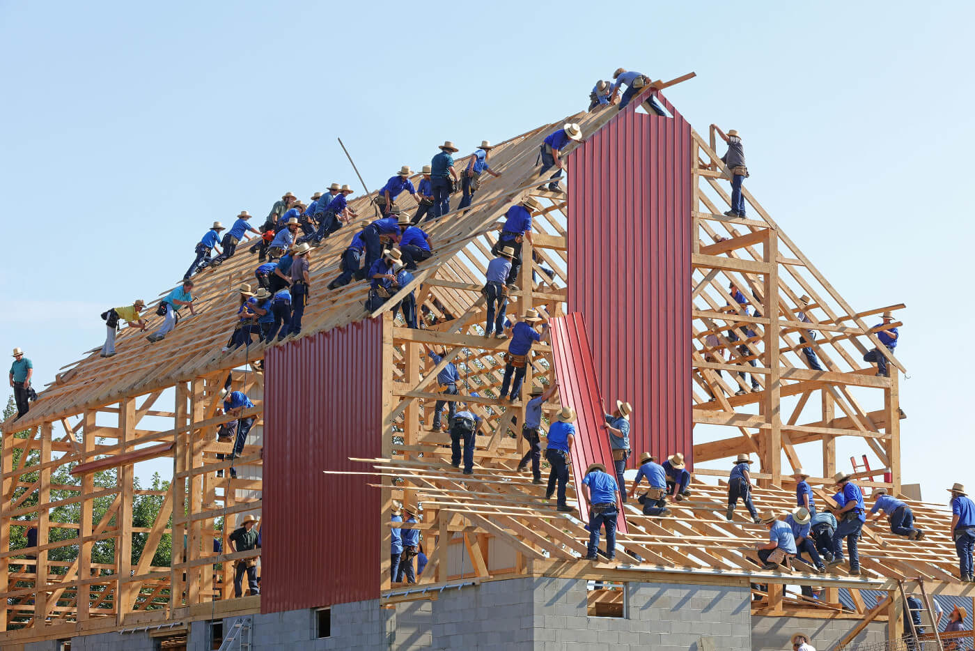 People building a house together