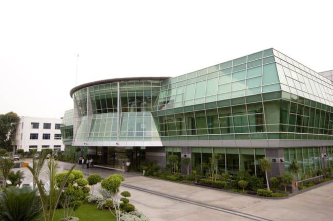 Samsung office building - Original image by Secl, source https://en.wikipedia.org/wiki/Samsung#/media/File:Samsung_Engineering_India_office.jpg Samsung office building - Original image by Secl, source https://en.wikipedia.org/wiki/Samsung#/media/File:Samsung_Engineering_India_office.jpg